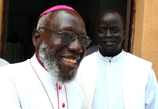 Retired Bishop Emeritus Paride Taban (in front) warns of dwindled development if conflicts continue [©Gurtong/ Juma J. Stephen]